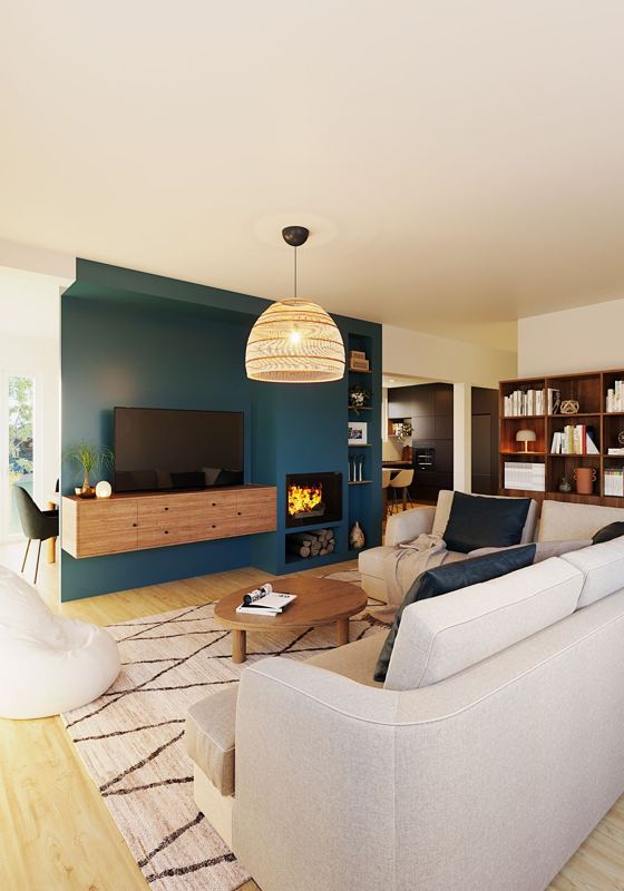 Salon rénové avec mur bleu canard, cheminée encastrée et canapé clair