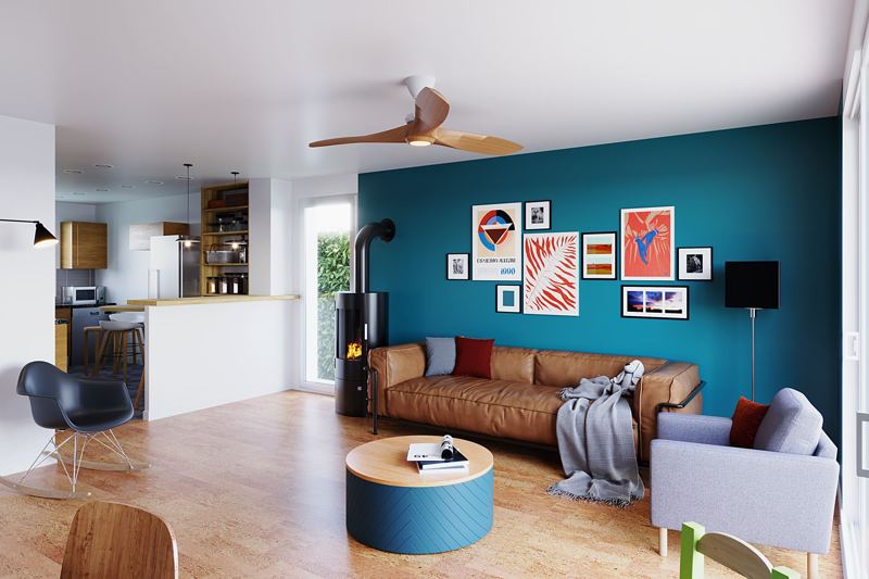 Pièce de vie avec mur bleu, canapé en cuir et poêle à bois